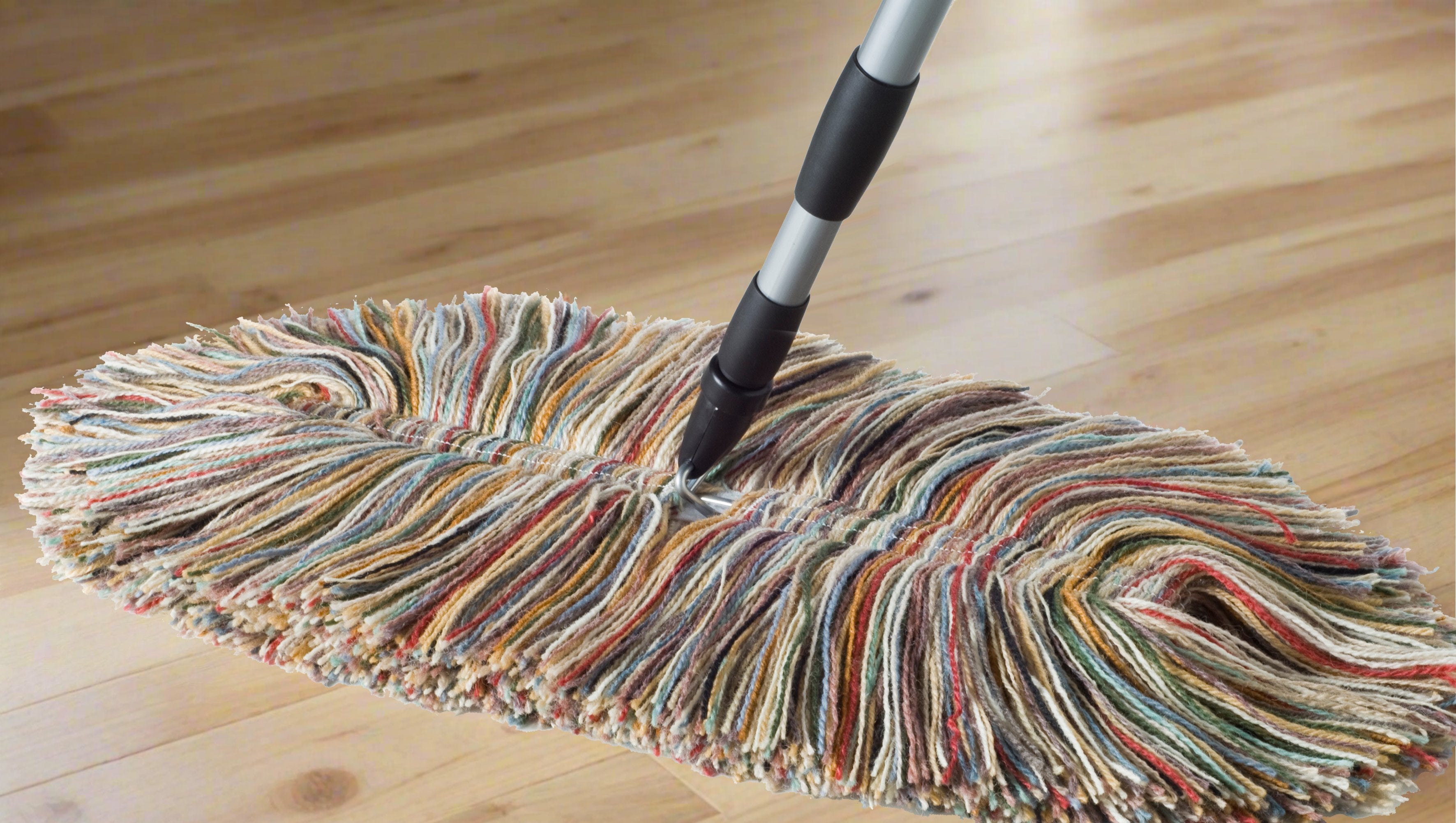 sladust wool dust mop on light hardwood floor